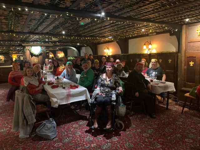 The Inclusion Gloucestershire staff and volunteer team at their Christmas meal